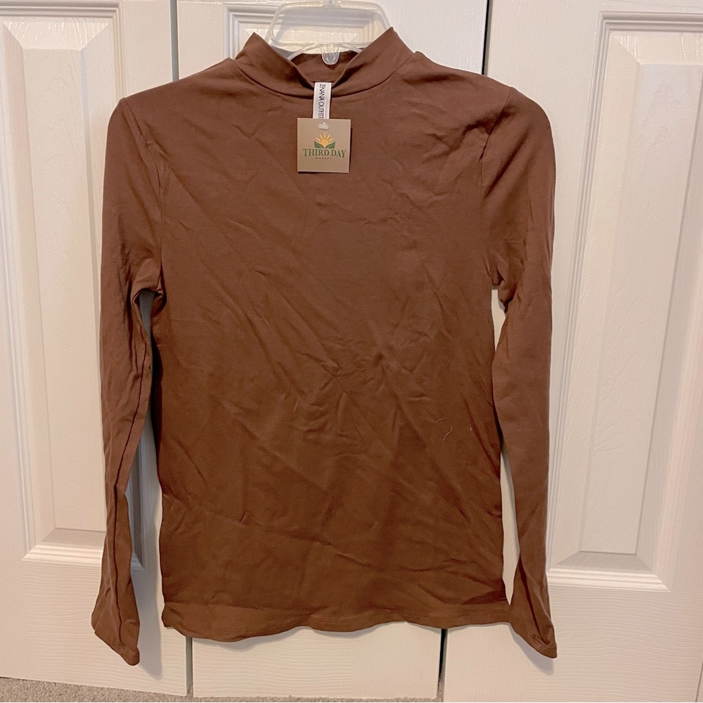 Dusty brown mock neck top.